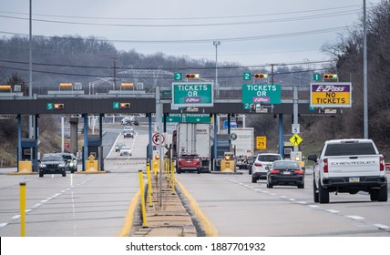 Denver,  Pennsylvania, USA- January, 4, 2021: Cars And Trucks Pass Through Pennsylvania Toll Plaza Which Will Now Use A Cashless System To Collect Tolls