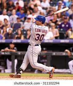 DENVER-AUG 21: New York Mets Outfielder Michael Conforto Swings At A Pitch During A Game Against The Colorado Rockies At Coors Field On August 21, 2015 In Denver, Colorado.