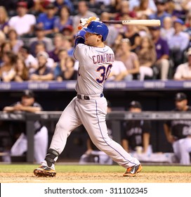 DENVER-AUG 21: New York Mets Outfielder Michael Conforto Swings At A Pitch During A Game Against The Colorado Rockies At Coors Field On August 21, 2015 In Denver, Colorado.