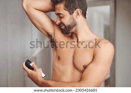 Deodorant, armpit spray and man in bathroom for hygiene, shower or perfume to control underarm sweating. Happy bare guy cleaning body with fragrance cosmetics, skincare product or male beauty at home