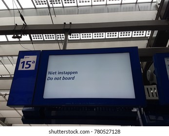 Departure Board On Rotterdam Central Station With Dual Language.