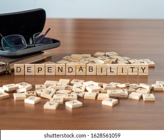 Dependability Concept Represented By Wooden Letter Tiles