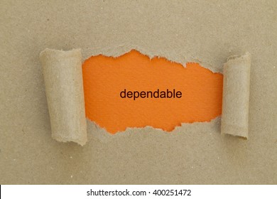 Dependable Word Written Under Torn Paper.