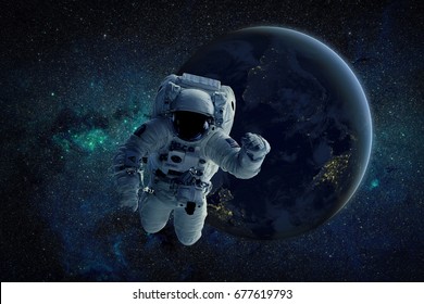 A depiction of an astronaut floating in outer space. Elements of this Image Furnished by NASA. - Powered by Shutterstock