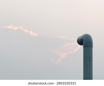 Depiction of a cloud getting soaked into a Pipe symbolising natural beauty being destroyed or erased by man made objects 