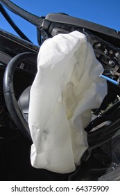 Deployed And Deflated Crash Safety Air Bag In A Heavily Damaged Wrecked Car After A Violent Traffic Accident