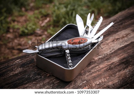 Deployed jackknife knife on the stand