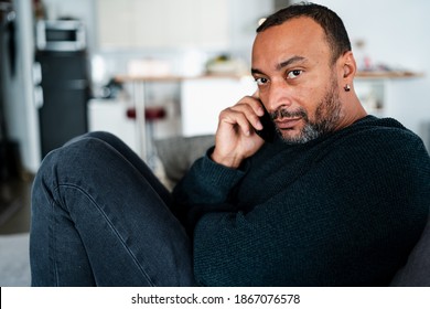 Depressed 40 Years Old Man Talking On The Phone