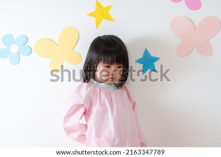 Depressed Asian nursery school child