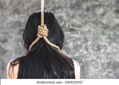 depressed Asian woman hanging herself suicide with rope