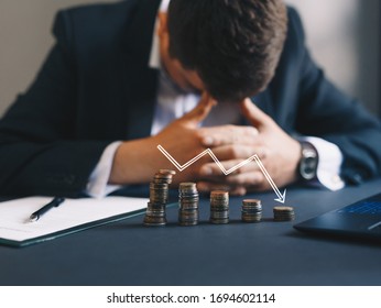 Depressed businessman lost his business. Destroyed businessman. Concept of business loss, bankruptcy and crisis.
 - Shutterstock ID 1694602114