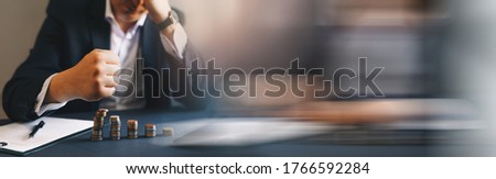 Depressed businessman lost his business. Destroyed businessman. Concept of business loss, bankruptcy and crisis. Panoramic banner with  copy space.
