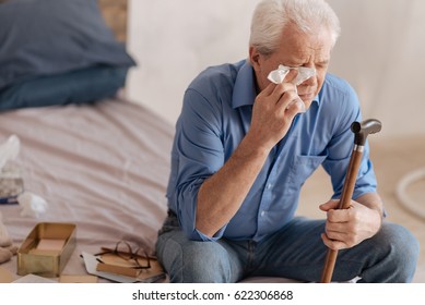 Depressed Gloomy Man Wiping Away His Tears