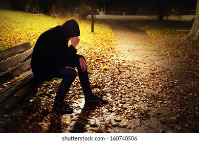 Depressed Man On Bench