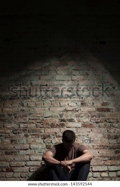 sad guy sitting