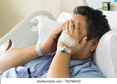 Depressed Patient Asian Man 40 On Hospital Bed With Hand Cover On His Face, Worry Or Mental Health Concept With Copy Space