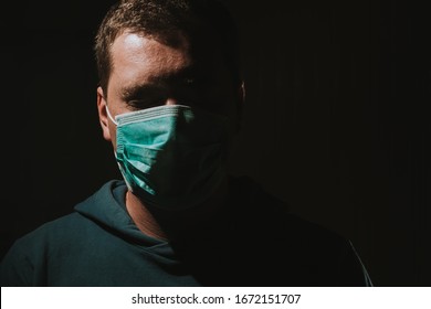 Depressed Sad Man Wearing Mask For Protection From Corona Virus Covid-19 