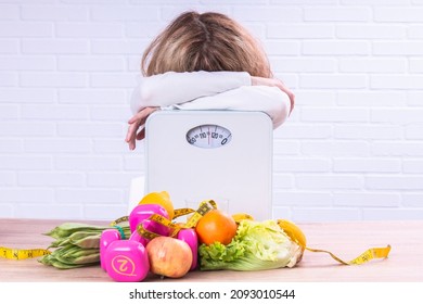 Depressed And Stressed Woman Unable To Control Diet To Lose Weight