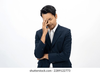 Depressed stressed. Young asian businessman on isolated white background. Angry businessman in office suit uniform. - Powered by Shutterstock