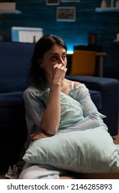 Depressed Suicidal Woman Sitting On Living Room Floor, Feeling Frustrated And Having Chronic Mental Disease Difficulties. Anxious Female Person Dealing With Sadness And Negativity.