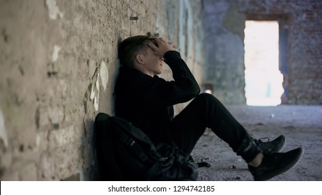 Depressed Teen Hiding From Bullying In Abandoned House, Difficult Adolescence