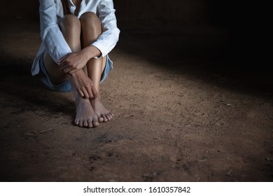 The Depressed Teen Sat On The Floor, Stressed Sad Young Woman Having Mental Problems,Domestic Violence And Trafficking