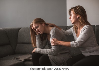 Depressed Teen Suffering From Anxiety Being Taken Care Of By Her Caring Mother