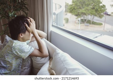 Depressed Teenage Boy Covering His Face,  Child Mental Health, Stop Bullying, Teen Autism Awareness Concept