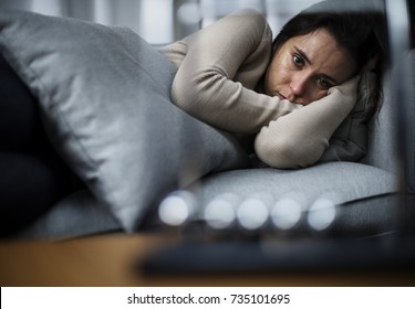 Depressed woman - Shutterstock ID 735101695