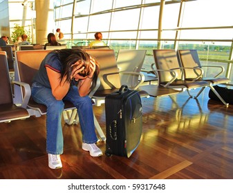 Depressed Woman Awaiting For Plane With Delay