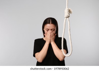 Depressed Woman Crying Near Rope Noose Stock Photo 1978950062 ...