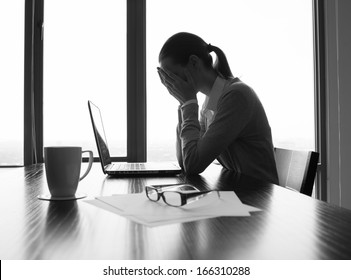 Depressed woman in the office