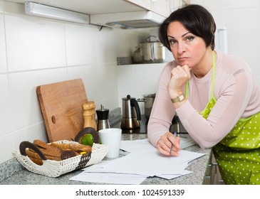 Depressed Woman Reading Bank Refuse Papers About Delay Of Payment 