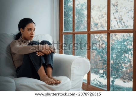 Depressed young Black woman with mental health problem in mind need crucial treatment from overthinking fatigue girl, disruptive thought, dissocial, anxiety and other mental health disorders .