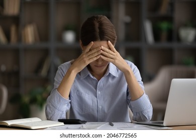 Depressed Young Woman Calculating Bills, Sitting At Desk With Laptop And Financial Documents, Upset Businesswoman Covering Face, Frustrated By Banking Loan Credit Debt, Bankruptcy, Money Loss Concept