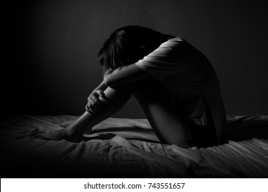 Depression Causes The Woman To Be Alone In A Dark Room.