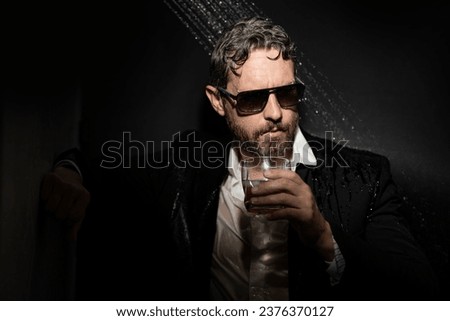 Depression drunk man with mental problems. Depressed business man with anxiety. Crisis. Man in suit in bathroom. Depressed man drinking whiskey. Alcohol depress and drugs. Depressed businessman.