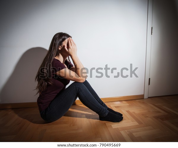 Depression Teenager Sitting On Floor Empty Stock Photo (Edit Now) 790495669