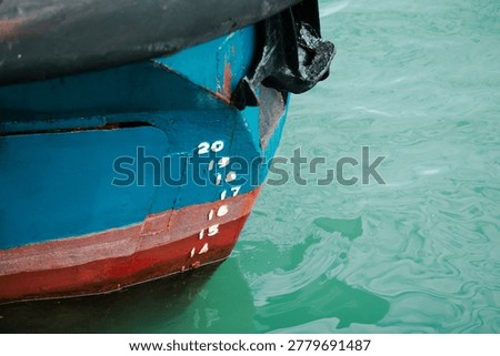 Depth Scale Numbers on Blue Ship Hull