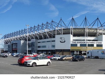 DERBY, ENGLAND - SEPTEMBER 13, 2019: Parked Cars In Front Of Pride Park Stadium In Derby, England