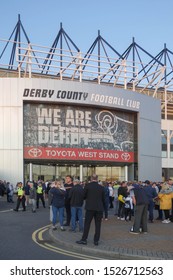 DERBY, ENGLAND - SEPTEMBER 13, 2019: People In Front Of Pride Park Stadium In Derby, England