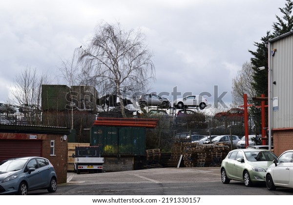 Derelict Cars Stored at\
Industrial Site