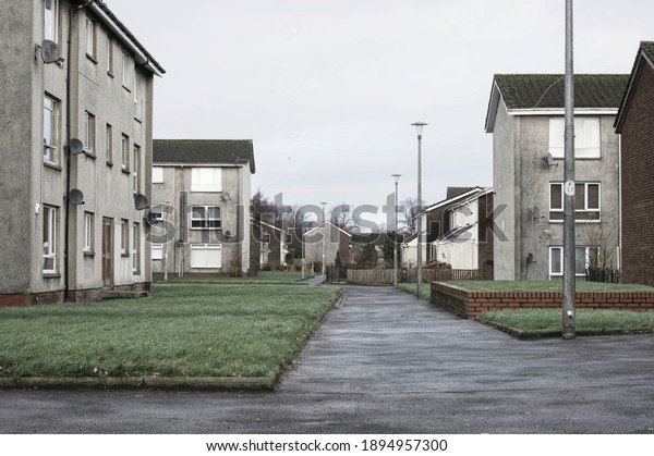 Derelict council house in poor\
housing estate slum with many social welfare issues in Port\
Glasgow