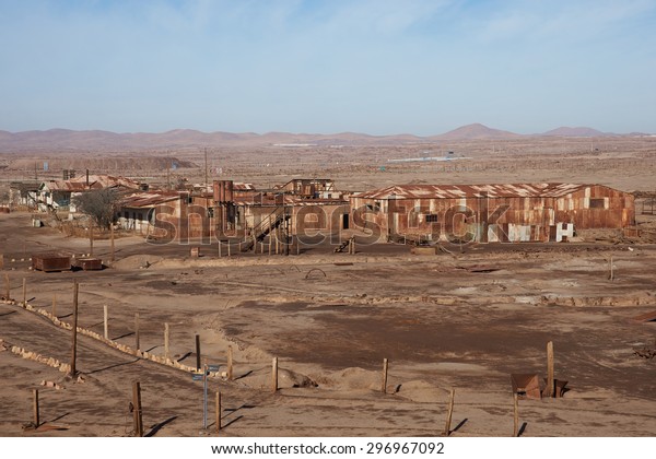 Derelict and rusting industrial building at the\
historic Humberstone Saltpeter Works in the Atacama Desert near\
Iquique in Chile. The site is now an open air museum and a Unesco\
World Heritage SIte.