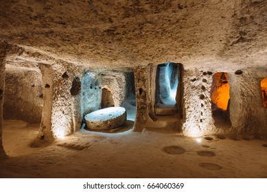 The Derinkuyu underground city is an ancient multi-level cave city in Cappadocia, Turkey. Stone used as a door in the old underground city