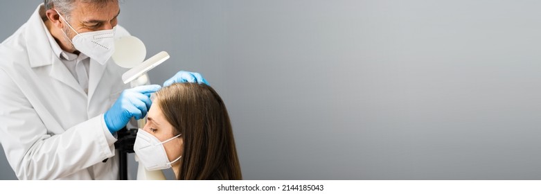 Dermatologist Doctor Checking Woman Hair For Dandruff In Face Mask