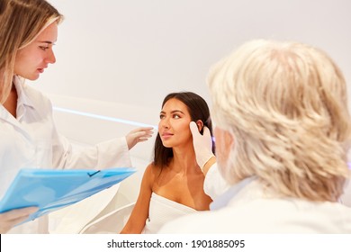 Dermatologist Team For Plastic Surgery Advising And Examining A Patient