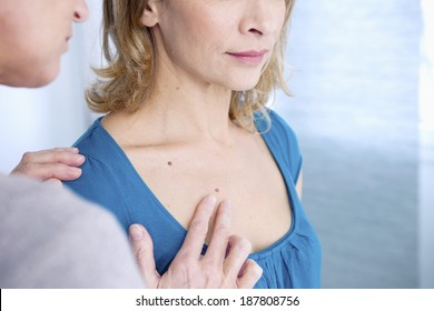 Dermatology Check Up With Woman Patient 