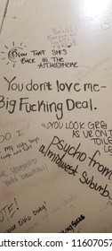 Des Moines, Iowa / USA - 08/04/2018: Magic Marker Bathroom Stall Graffiti Writing On Women's Bathroom Stall Wall 