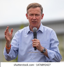 Des Moines, Iowa / USA - August 10 2019: Colorado Governor and Democratic presidential candidate John Hickenlooper greets supporters at the Iowa State Fair political soapbox in Des Moines, Iowa.